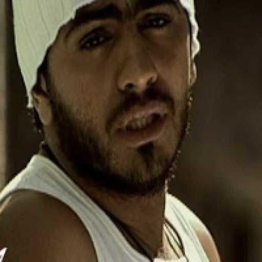 كلمات اغنية تامر حسني – حضن الغريب مكتوبة